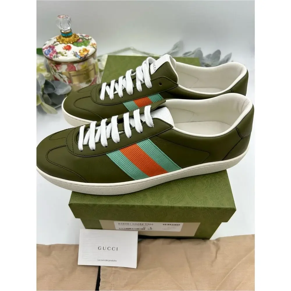 Men's Gucci, leather web design sneakers size 8 fits 8.5 US made in Italy